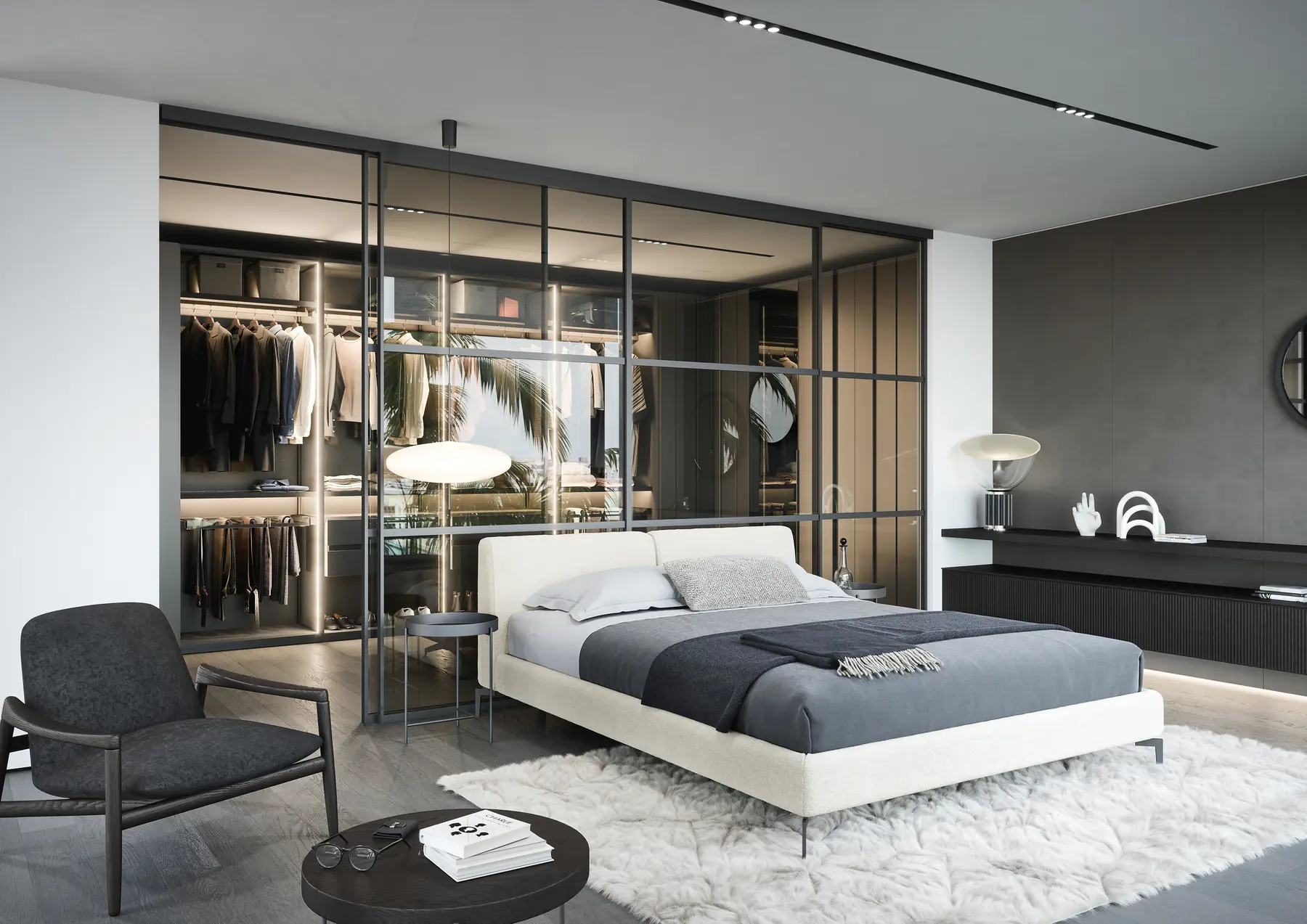Schlafzimmer mit Bett und begehbarer Ankleide hinter Glastüren